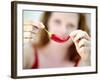 Woman Holding out a Red Chili Pepper-Maren Brinkmann-Framed Photographic Print