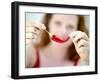 Woman Holding out a Red Chili Pepper-Maren Brinkmann-Framed Photographic Print