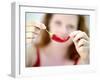 Woman Holding out a Red Chili Pepper-Maren Brinkmann-Framed Photographic Print