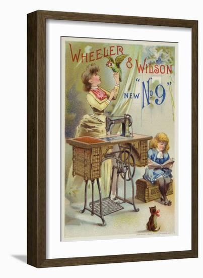 Woman Holding Parrot Next to Sewing Machine-null-Framed Premium Giclee Print