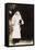 Woman Holding Two Puppies in a Garden-null-Framed Stretched Canvas