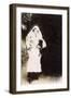 Woman Holding Two Puppies in a Garden-null-Framed Photographic Print