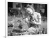 Woman Holds Chicken for Feeding-Philip Gendreau-Framed Photographic Print