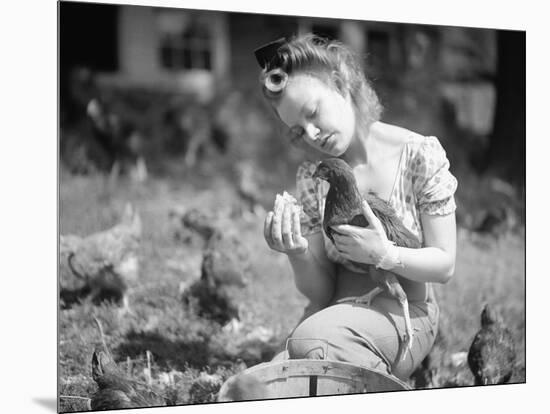 Woman Holds Chicken for Feeding-Philip Gendreau-Mounted Photographic Print
