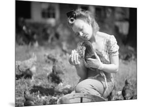 Woman Holds Chicken for Feeding-Philip Gendreau-Mounted Photographic Print