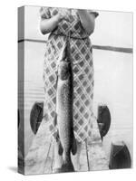 Woman Holds on Large Northern Pike on a Lake Pier, Ca. 1950-null-Stretched Canvas