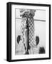 Woman Holds on Large Northern Pike on a Lake Pier, Ca. 1950-null-Framed Photographic Print