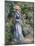 Woman in a Blue Dress Standing in the Garden at Saint-Cloud-Pierre-Auguste Renoir-Mounted Giclee Print