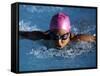 Woman in Action During a Butterfly Swimming Race-null-Framed Stretched Canvas