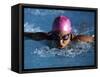 Woman in Action During a Butterfly Swimming Race-null-Framed Stretched Canvas