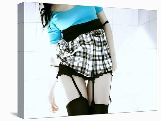 Woman in Garter Belts and Plaid Skirt-Paula Iannuzzi-Stretched Canvas