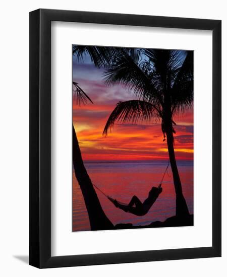 Woman in Hammock, and Palm Trees at Sunset, Coral Coast, Viti Levu, Fiji, South Pacific-David Wall-Framed Premium Photographic Print