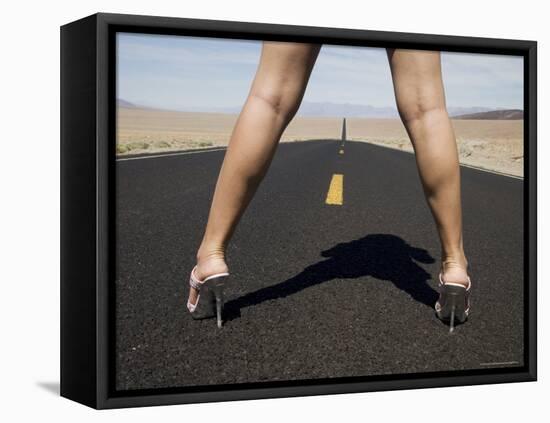 Woman in High Heels on Empty Road, Death Valley National Park, California-Angelo Cavalli-Framed Stretched Canvas