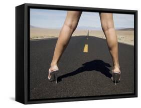 Woman in High Heels on Empty Road, Death Valley National Park, California-Angelo Cavalli-Framed Stretched Canvas