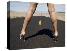 Woman in High Heels on Empty Road, Death Valley National Park, California-Angelo Cavalli-Stretched Canvas