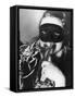 Woman in Mask Celebrating at a New Years Party-null-Framed Stretched Canvas