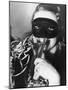 Woman in Mask Celebrating at a New Years Party-null-Mounted Photographic Print