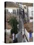 Woman in Narrow Alley with Whitewashed Houses, Obidos, Portugal-Merrill Images-Stretched Canvas