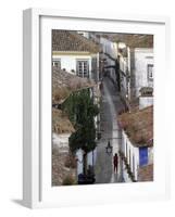 Woman in Narrow Alley with Whitewashed Houses, Obidos, Portugal-Merrill Images-Framed Photographic Print