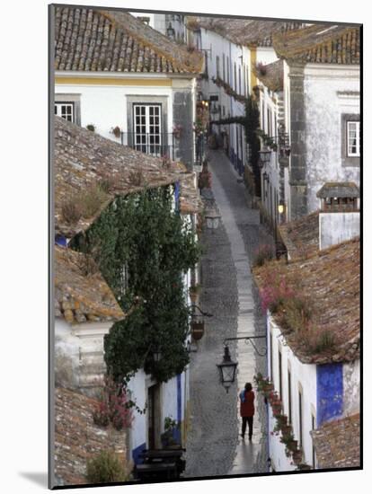 Woman in Narrow Alley with Whitewashed Houses, Obidos, Portugal-Merrill Images-Mounted Photographic Print
