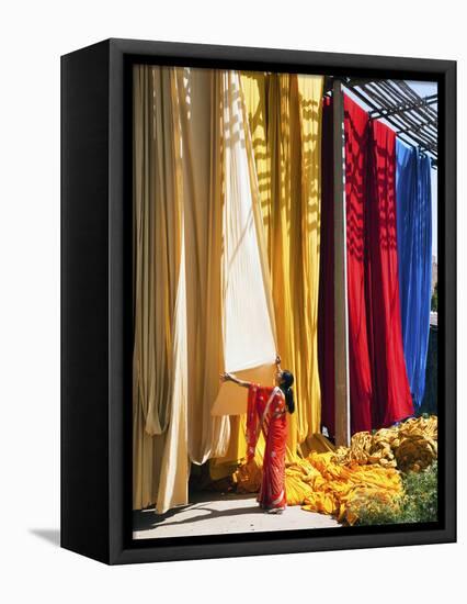 Woman in Sari Checking the Quality of Freshly Dyed Fabric Hanging to Dry, Sari Garment Factory, Raj-Gavin Hellier-Framed Stretched Canvas