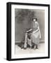 Woman in Striped Dress with Golf Clubs-null-Framed Photo