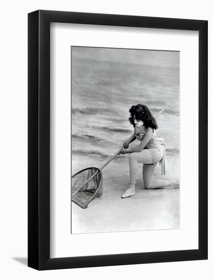 Woman in swimsuit with fishing net-French School-Framed Photographic Print