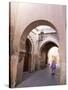 Woman in Traditional Djellaba Dress in Narrow Streets of Old Quarter, Medina, Marrakesh, Morocco-Stephen Studd-Stretched Canvas