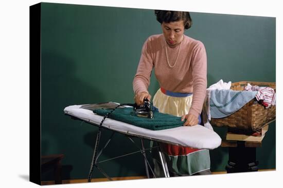 Woman Ironing at Home-William P. Gottlieb-Stretched Canvas