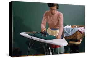 Woman Ironing at Home-William P. Gottlieb-Stretched Canvas