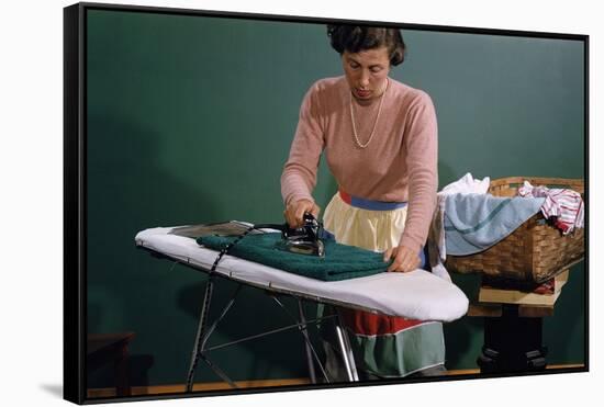 Woman Ironing at Home-William P. Gottlieb-Framed Stretched Canvas