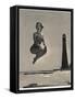 Woman Jumping in Front of Cape Florida Lighthouse, C.1975-null-Framed Stretched Canvas