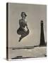 Woman Jumping in Front of Cape Florida Lighthouse, C.1975-null-Stretched Canvas