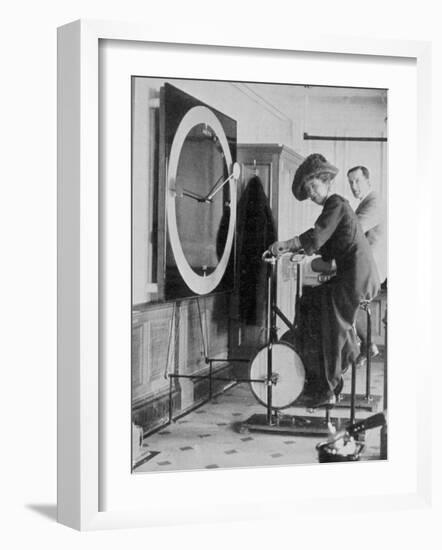 Woman Keeping Fit in the Titanic's Gymnasium-null-Framed Photographic Print