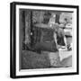 Woman Kissing the Blarney Stone-Hans Wild-Framed Photographic Print