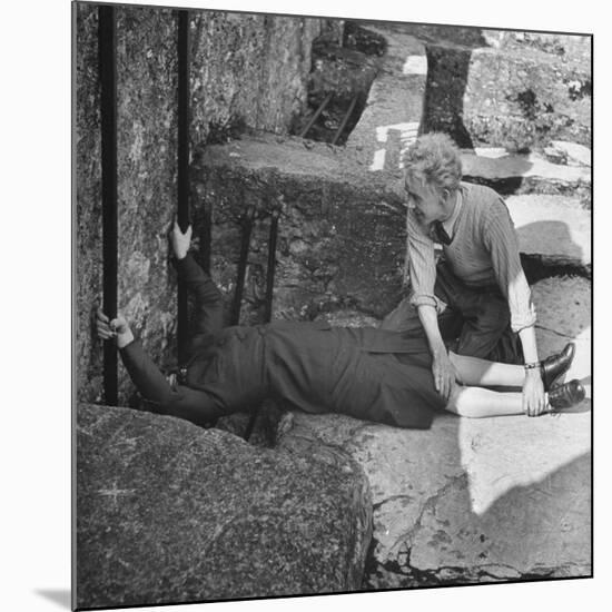 Woman Kissing the Blarney Stone-Hans Wild-Mounted Photographic Print