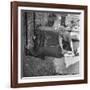 Woman Kissing the Blarney Stone-Hans Wild-Framed Photographic Print