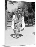 Woman Kneels and Pets Baby Ostrich-Philip Gendreau-Mounted Photographic Print