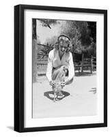 Woman Kneels and Pets Baby Ostrich-Philip Gendreau-Framed Photographic Print