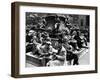 Woman Knitting Among Lunchtime Loungers Relaxing at Base of Statue at New York Public Library-Alfred Eisenstaedt-Framed Photographic Print