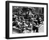 Woman Knitting Among Lunchtime Loungers Relaxing at Base of Statue at New York Public Library-Alfred Eisenstaedt-Framed Photographic Print