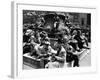 Woman Knitting Among Lunchtime Loungers Relaxing at Base of Statue at New York Public Library-Alfred Eisenstaedt-Framed Photographic Print