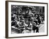 Woman Knitting Among Lunchtime Loungers Relaxing at Base of Statue at New York Public Library-Alfred Eisenstaedt-Framed Photographic Print