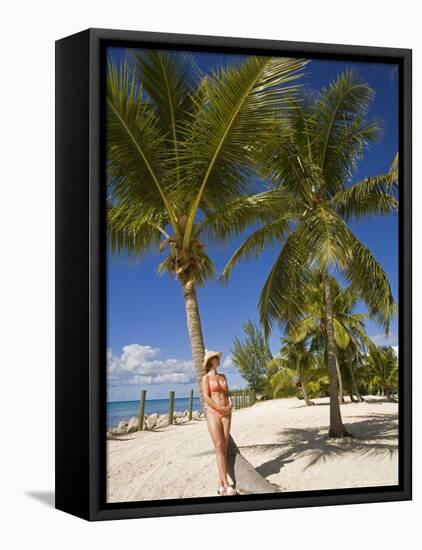 Woman Leaning Against Palm Tree, Princess Cays, Eleuthera Island, West Indies, Caribbean-Richard Cummins-Framed Stretched Canvas