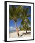 Woman Leaning Against Palm Tree, Princess Cays, Eleuthera Island, West Indies, Caribbean-Richard Cummins-Framed Photographic Print