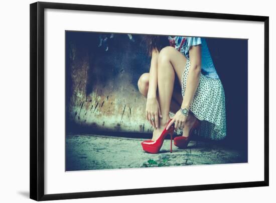 Woman Legs In Red High Heel Shoes And Short Skirt Outdoor Shot Against Old Metal Door-coka-Framed Art Print