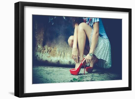 Woman Legs In Red High Heel Shoes And Short Skirt Outdoor Shot Against Old Metal Door-coka-Framed Art Print