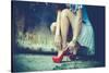 Woman Legs In Red High Heel Shoes And Short Skirt Outdoor Shot Against Old Metal Door-coka-Stretched Canvas