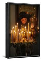 Woman lighting a candle, Trinity Cathedral-Godong-Framed Photographic Print