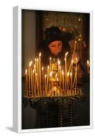 Woman lighting a candle, Trinity Cathedral-Godong-Framed Photographic Print